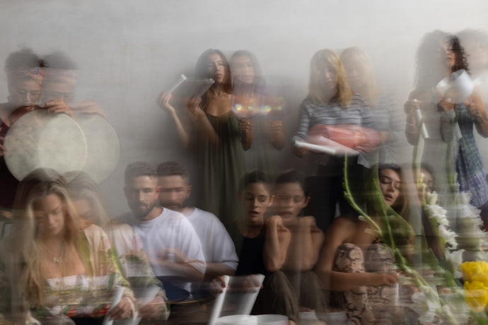 Avery Whitmore Leading a Group Sound Healing Session with Instruments - Inspiring Relaxation and Transformative Healing at The Sound Healing Studio in Los Angeles, California
